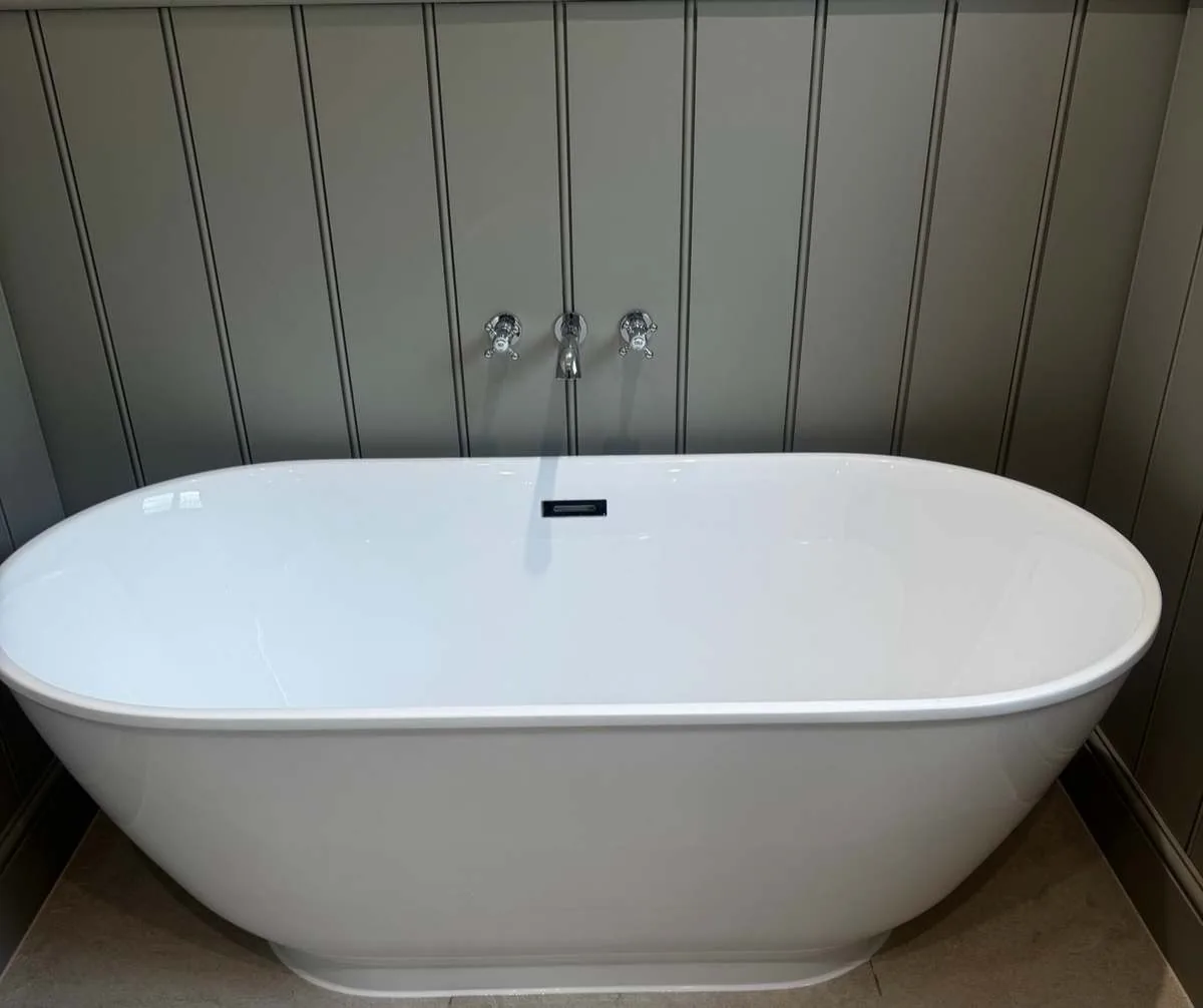 Contemporary bathtub installation by JLP Plumbing