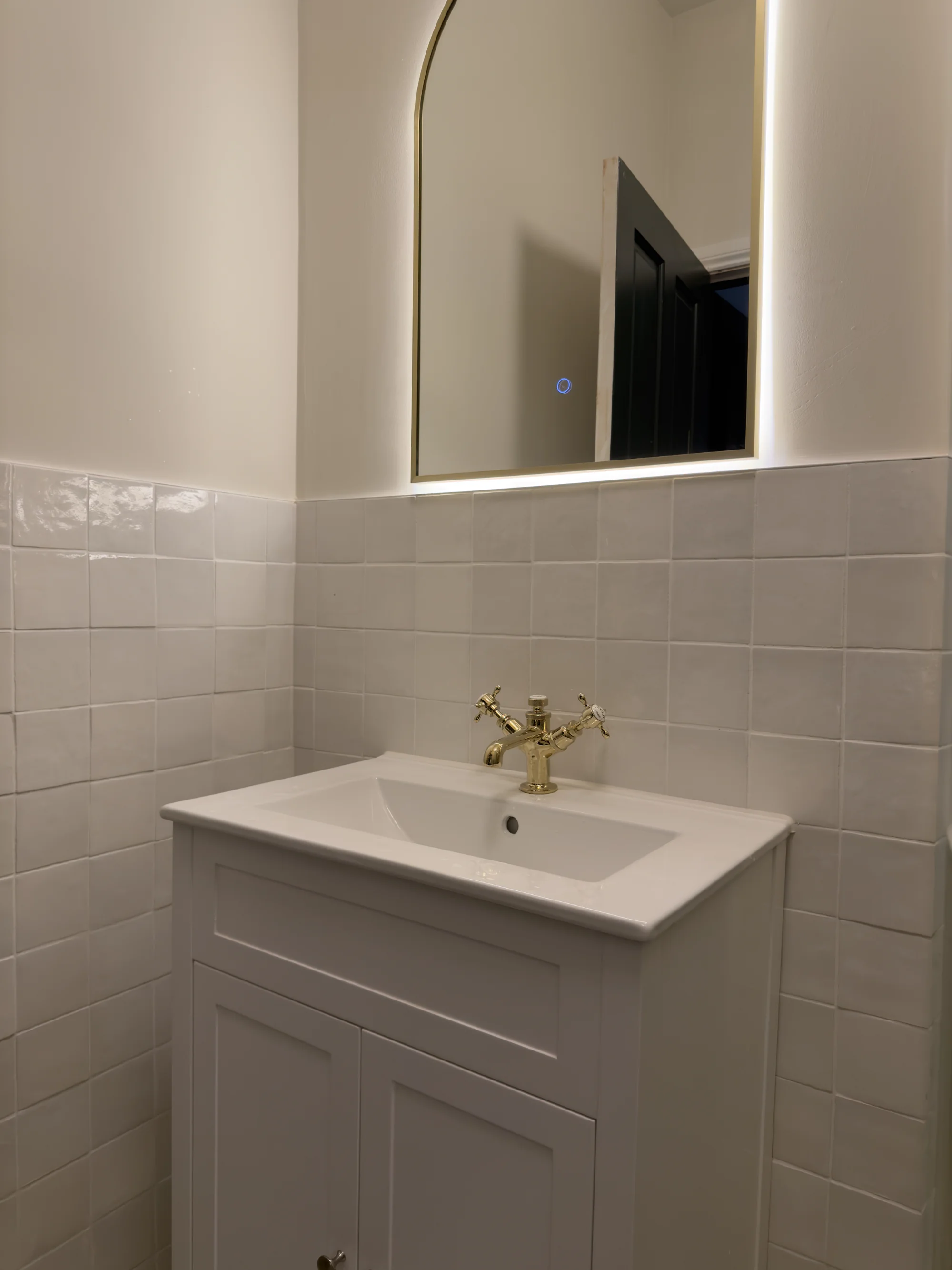Shaker vanity with a brass crosshead tap and backlit mirror, Hitchin