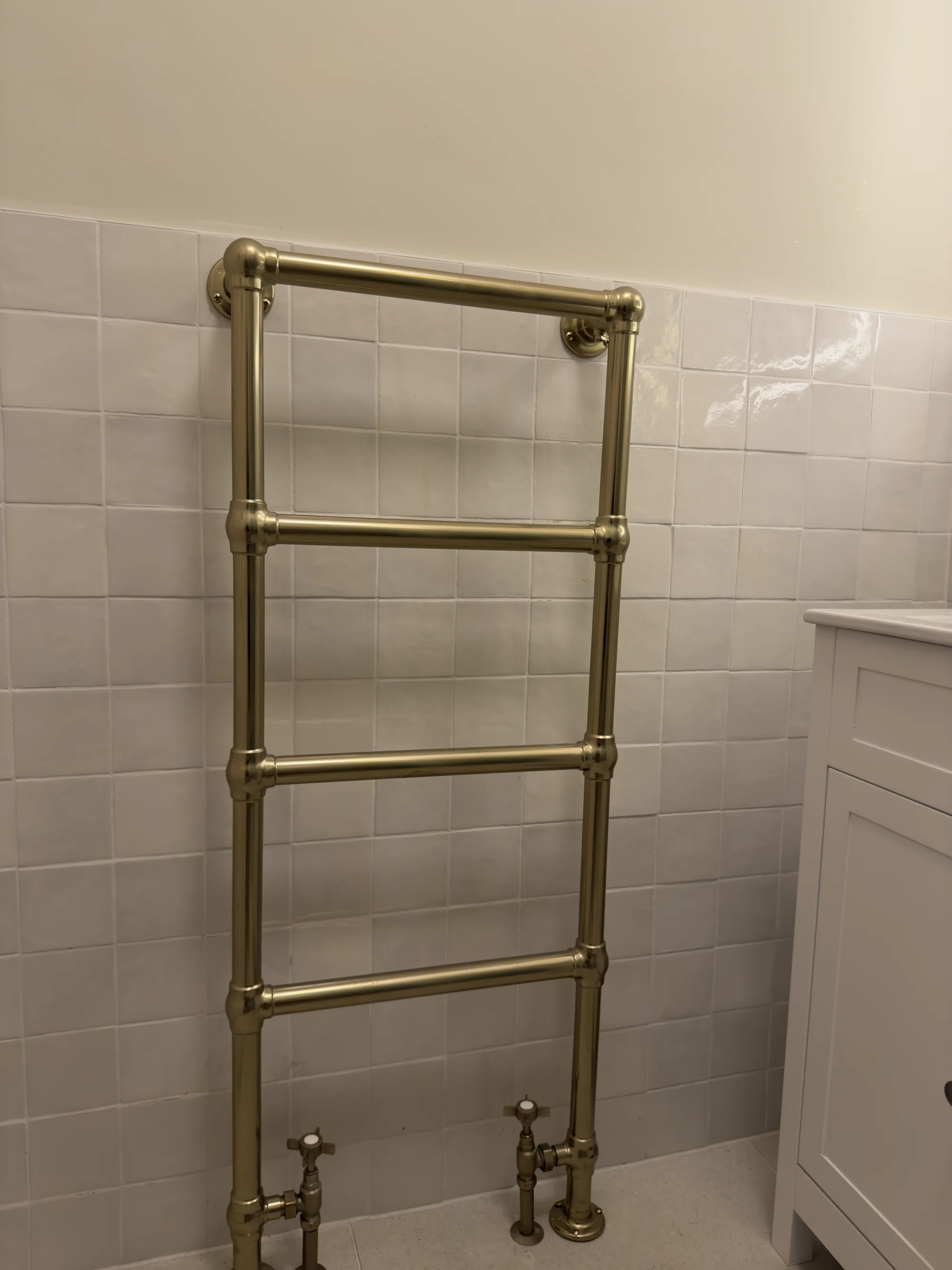Traditional brass heated towel rail, bathroom installation Hitchin