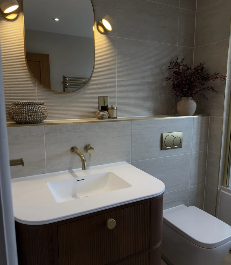 Concealed cistern WC with a brass flush plate and floating shelf, Weston