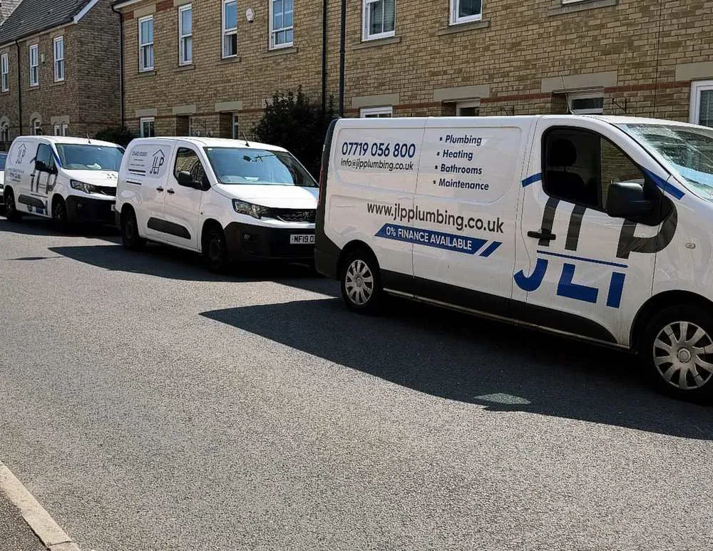 JLP Plumbing van fleet on a Hertfordshire street